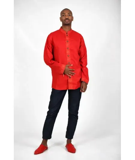 Red shirt embroidered in gold thread and metal buttons