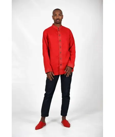 Red shirt embroidered in gold thread and metal buttons